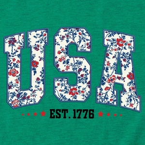 Detail of USA floral print with stars and EST. 1776 text on green cotton t-shirt
