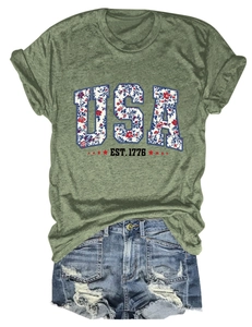 Detail showing USA floral print and EST 1776 star graphic on army green t-shirt fabric