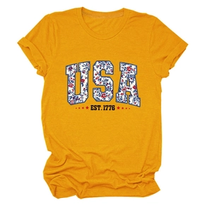 Detail of USA EST. 1776 graphic print with floral pattern on mustard yellow cotton t-shirt