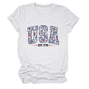 Detail of USA EST 1776 graphic print with red and blue floral patterns on white cotton T-shirt
