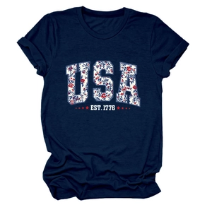 Close-up of navy USA EST. 1776 graphic print with red floral star details on cotton T-shirt