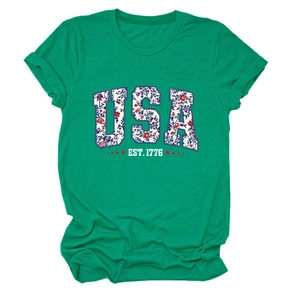 Close-up of USA EST. 1776 floral print on a vibrant green cotton crewneck T-shirt