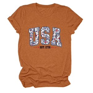 Detail of USA EST 1776 floral print on a brick red crew neck t-shirt with rolled sleeves