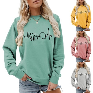 Detail view of colorful long-sleeve sweatshirts with 911 heartbeat and headset print