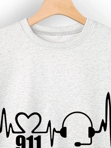 Detail of light grey crewneck sweatshirt with black heartbeat and headphone print