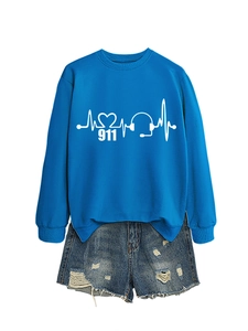 Close-up of blue sweatshirt with heartbeat headphone print and ripped denim shorts