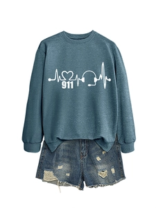 Detail of greyish-blue sweatshirt with heart rhythm print and distressed denim shorts set