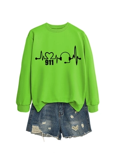 Bright green sweatshirt with 911 heartbeat and headset print paired with denim shorts