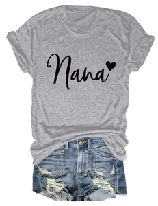 Detail of Nana heart print on grey short sleeve T-shirt with distressed denim shorts