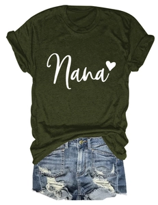 Flat lay of olive green cotton Nana heart t-shirt with distressed blue denim shorts
