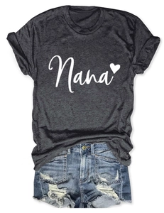 Detail of dark grey Nana heart print t-shirt paired with distressed denim shorts