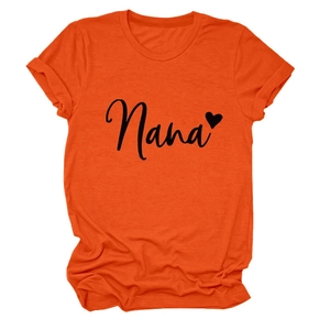Detail of Nana heart print on orange cotton t-shirt with rolled sleeves and round neck
