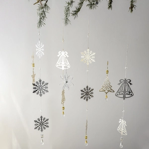 Christmas iron ornaments with snowflakes, bells and crystals for holiday tree decoration
