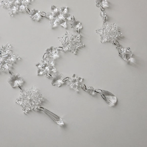Clear acrylic snowflake ornaments with faceted crystal drops for Christmas tree decor