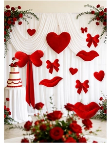 Close-up of red velvet heart, lip and bow decorations for Valentine's party setup
