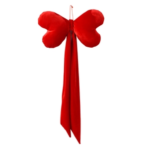 Large red velvet bow hanging ornament with heart loops for romantic party scene decor