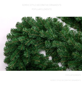 Close-up of dense green PVC pine needles for DIY Christmas garland and Nordic home decor