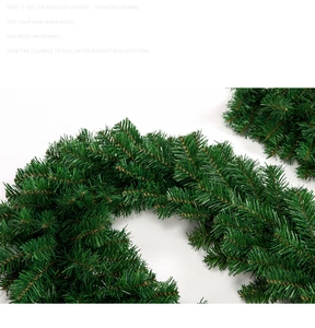 Detailed close-up of flexible green PVC pine needle garland for Christmas decor