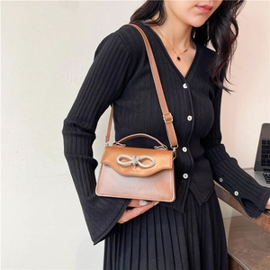 Brown PU leather crossbody bag with sparkling silver rhinestone bow decoration