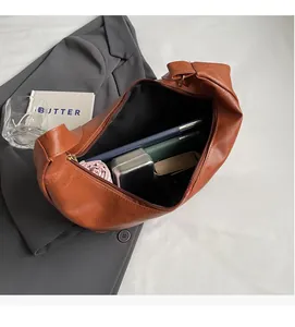Top view of brown vintage tote bag showing large capacity for tablet and daily items