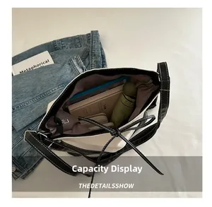 Top view of large canvas tote bag showing spacious interior with daily essentials