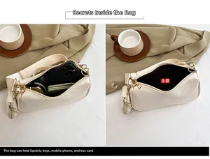Detail view of cream PU leather crossbody bag with spacious interior and mini coin pouch