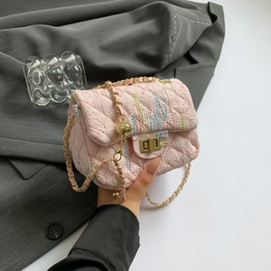 Pink quilted crossbody bag with striped embroidery and gold chain strap handle