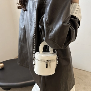 Chic white mini cylinder bucket bag with silver metal chain and top handle for women
