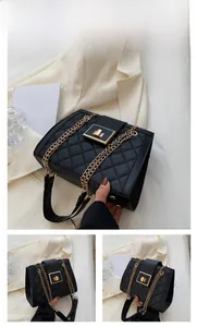 Detail of black quilted shoulder bag with gold chain strap and metallic twist lock clasp