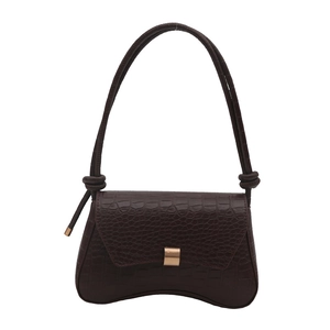 Dark brown crocodile embossed shoulder bag with unique curved base and gold buckle