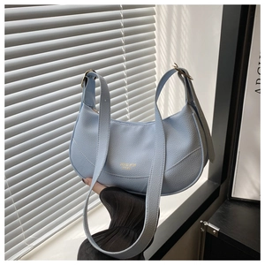 Sky blue hobo shoulder bag featuring lychee grain leather and golden metal hardware detail