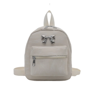 Petit sac à dos crème tendance avec nœud métallique argenté et double fermeture éclair