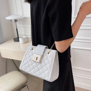 Elegant white quilted crossbody bag with gold chain strap and textured diamond pattern