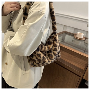 Close-up of leopard print plush shoulder bag with high-quality faux fur texture