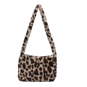 Fashionable leopard print plush shoulder bag with golden zipper on white background