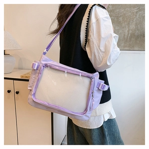 Detail view of purple nylon tote bag with a clear window for badges on a model's back