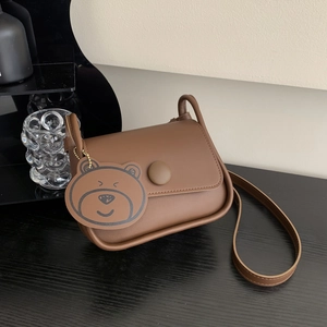 Brown PU leather minimalist square crossbody bag with a large cute bear charm