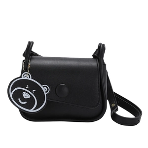 Minimalist black vintage shoulder bag with adjustable strap and bear head charm pendant