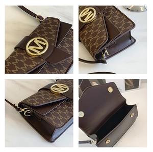 Detail view of brown monogram PU shoulder bag with gold M-logo buckle and magnetic flap