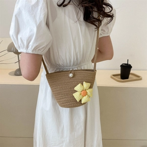 Straw woven crossbody beach bag with large plaid floral ornament and pearl button