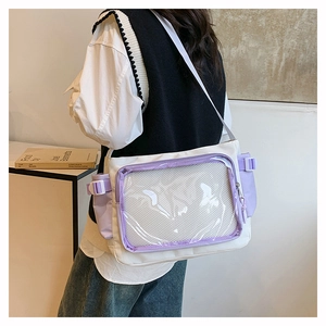 Detail view of white canvas itabag with transparent window and lavender accents