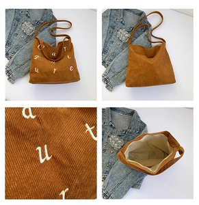 Détails du sac cabas en velours côtelé marron montrant broderie et fermoir magnétique