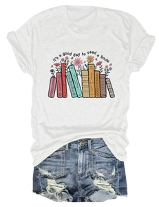 Flat lay of white T-shirt with 'it's a good day to read' print and ripped denim shorts
