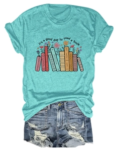 Detailed flat lay of Tiffany blue t-shirt featuring colorful book and floral graphic print
