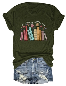 Detail of green cotton T-shirt with 'it's a good day to read' book and flower print