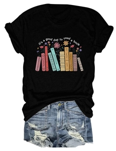 Detailed view of the 'it's a good day to read' slogan with floral and book graphics