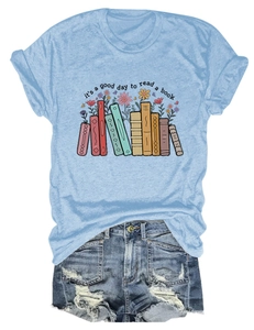 Close-up of light blue round neck T-shirt with book and flower print and denim shorts