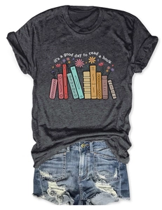 Close-up of it's a good day to read text and book illustration on a gray casual T-shirt