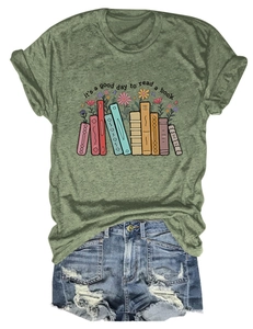 Detail of army green crew neck tee with book illustration and distressed denim shorts