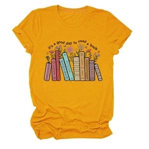 Detail of floral book print on mustard yellow cotton T-shirt with inspirational quote